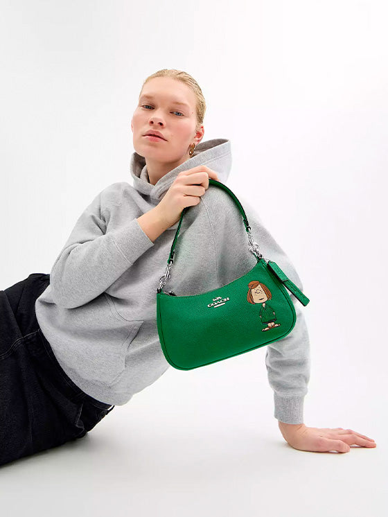 Bolsa Coach x Peanuts Teri Peppermint Patty (Edição Limitada)