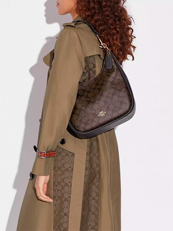 Bolso Coach Jules Hobo en lona Signature