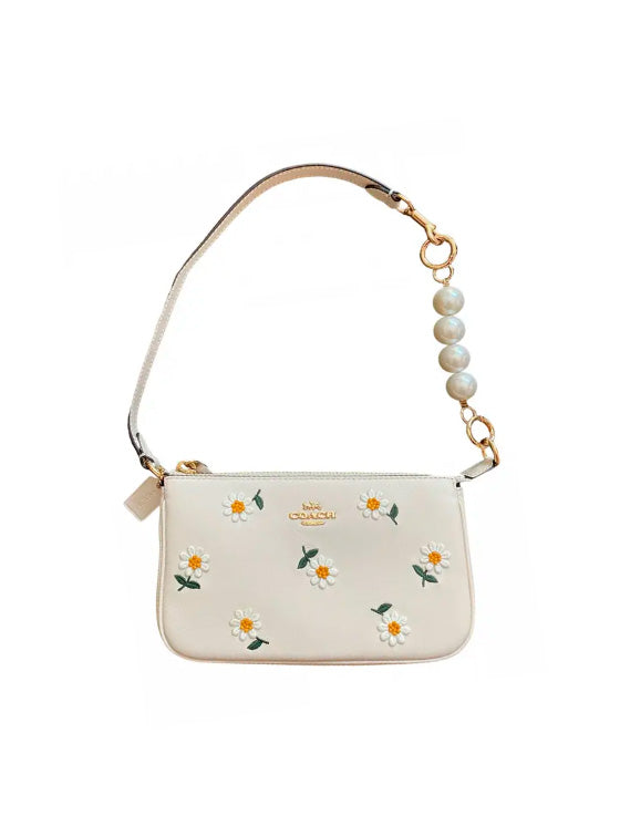 Bolsa Coach Nolita 19 com Bordado de Margaritas