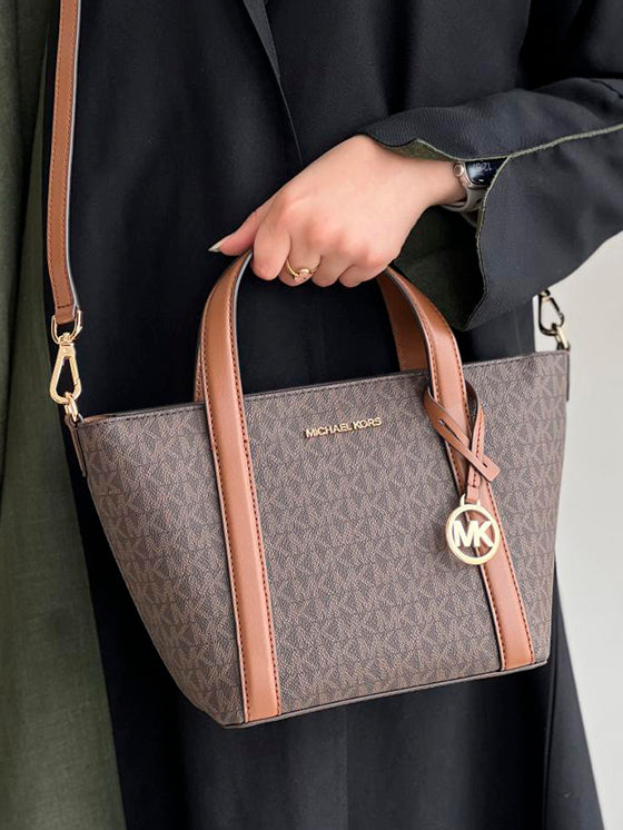 Bolso Michael Kors Pratt Messenger Castanho